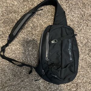 Patagonia black Atom 8L sling bag